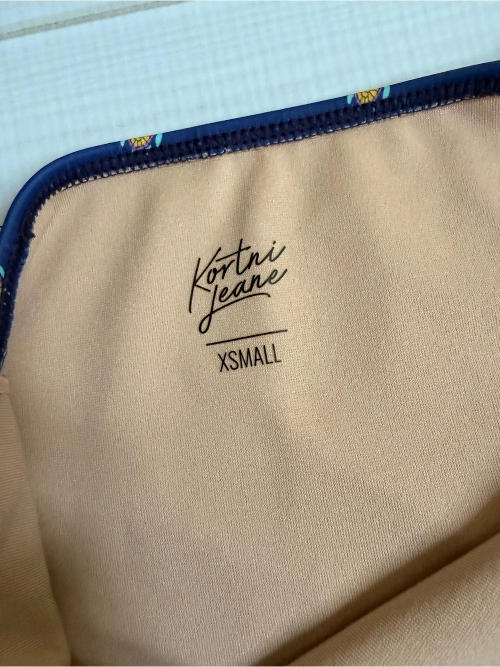 Kortni Jeane Beige Lined Swim Bottom with Navy Trim and Yellow Accents